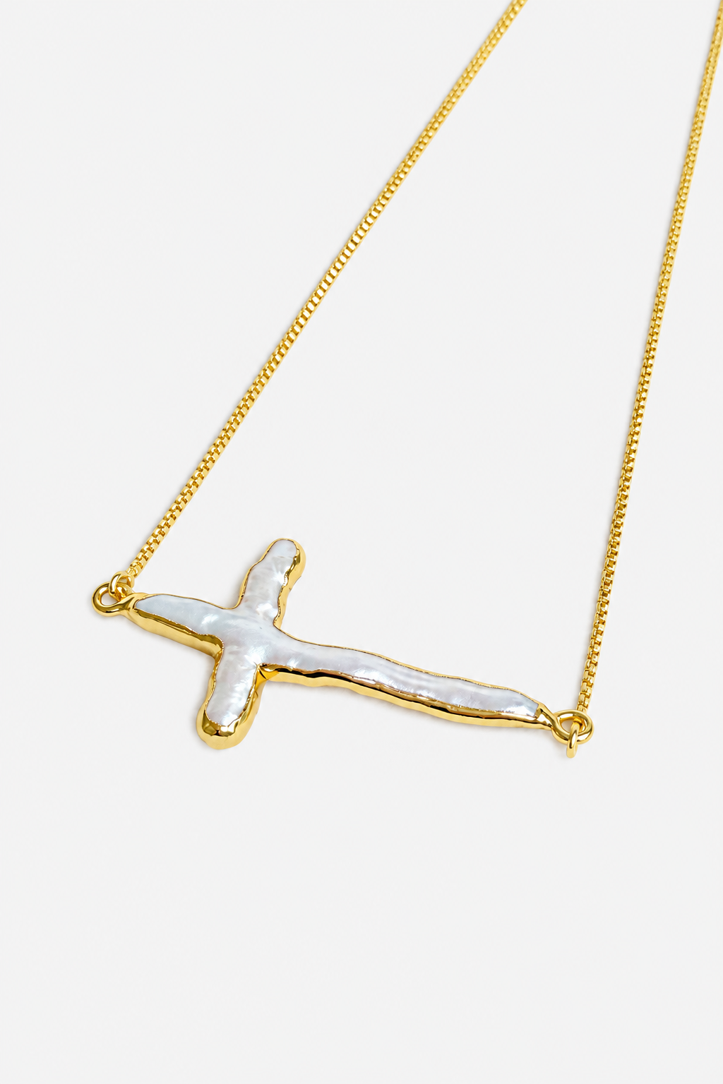 Freshwater pearl cross pendant detail